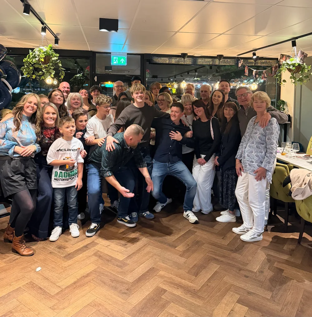 A birthday group celebrating together inside breathe Cafe Bar