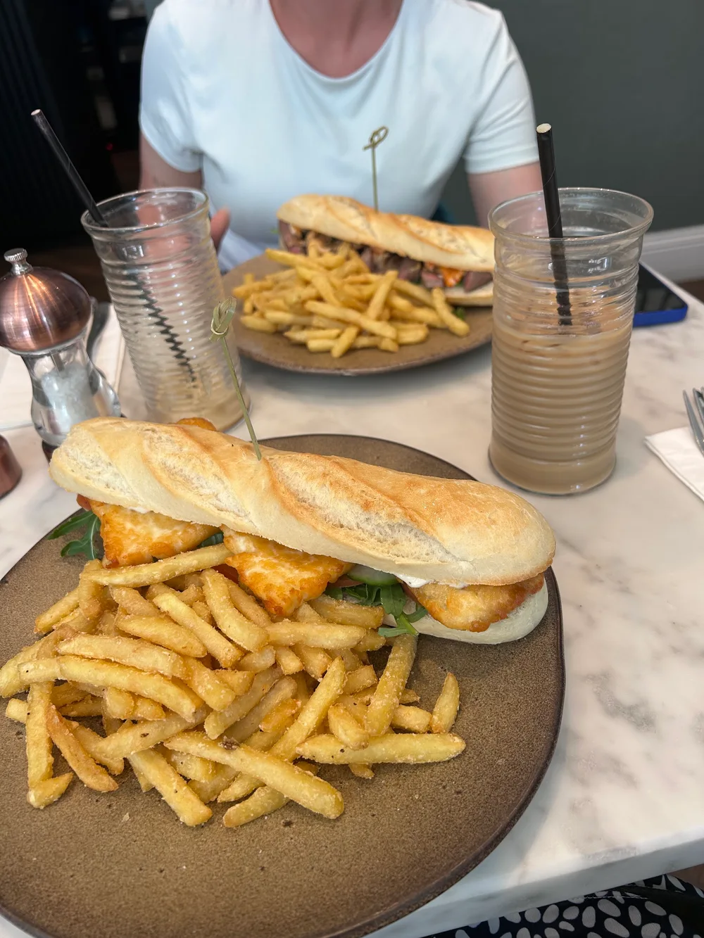 Sandwiches with chips and drinks at breathe Cafe Bar